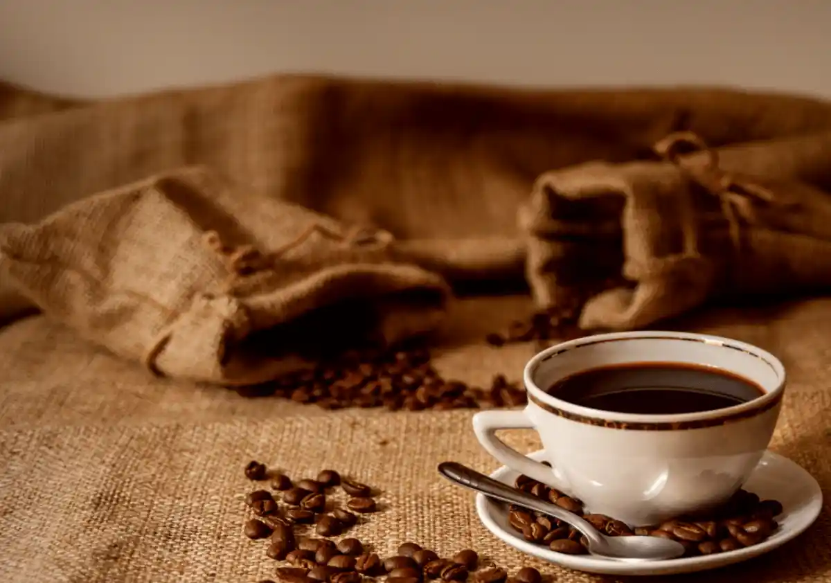 cup of coffee and coffee beans